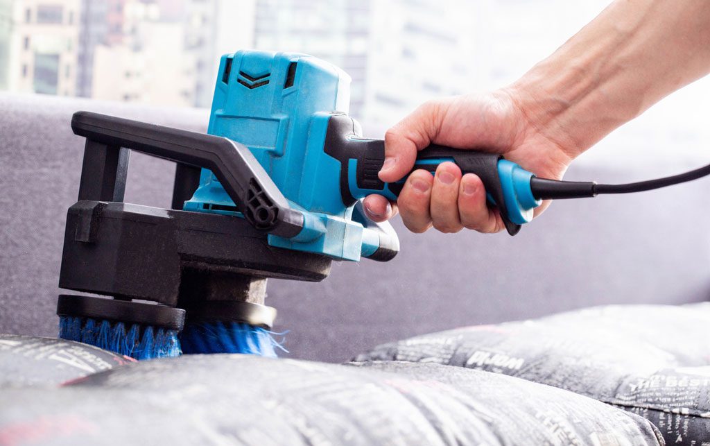 Cleaning the sofa with special equipment, an electric brush to lift the pile on the upholstery of the sofa. Dry cleaning of upholstered furniture